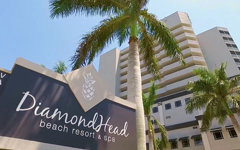 DiamondHead Beach Resort sign in front of hotel building