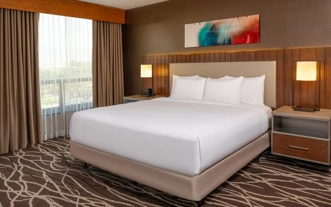 a bed with white sheets