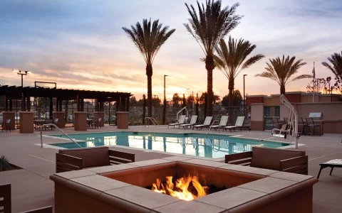 a pool with a fire pit