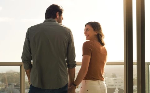 a man and a woman talking