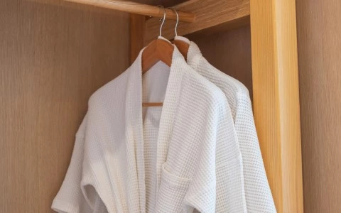 white robes on hangers