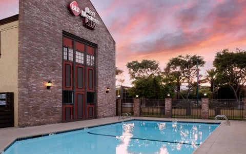 a building with a pool right next to it