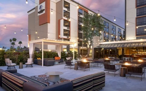 a building with a patio and lights