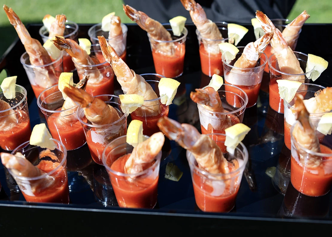 a tray of shrimp cocktails
