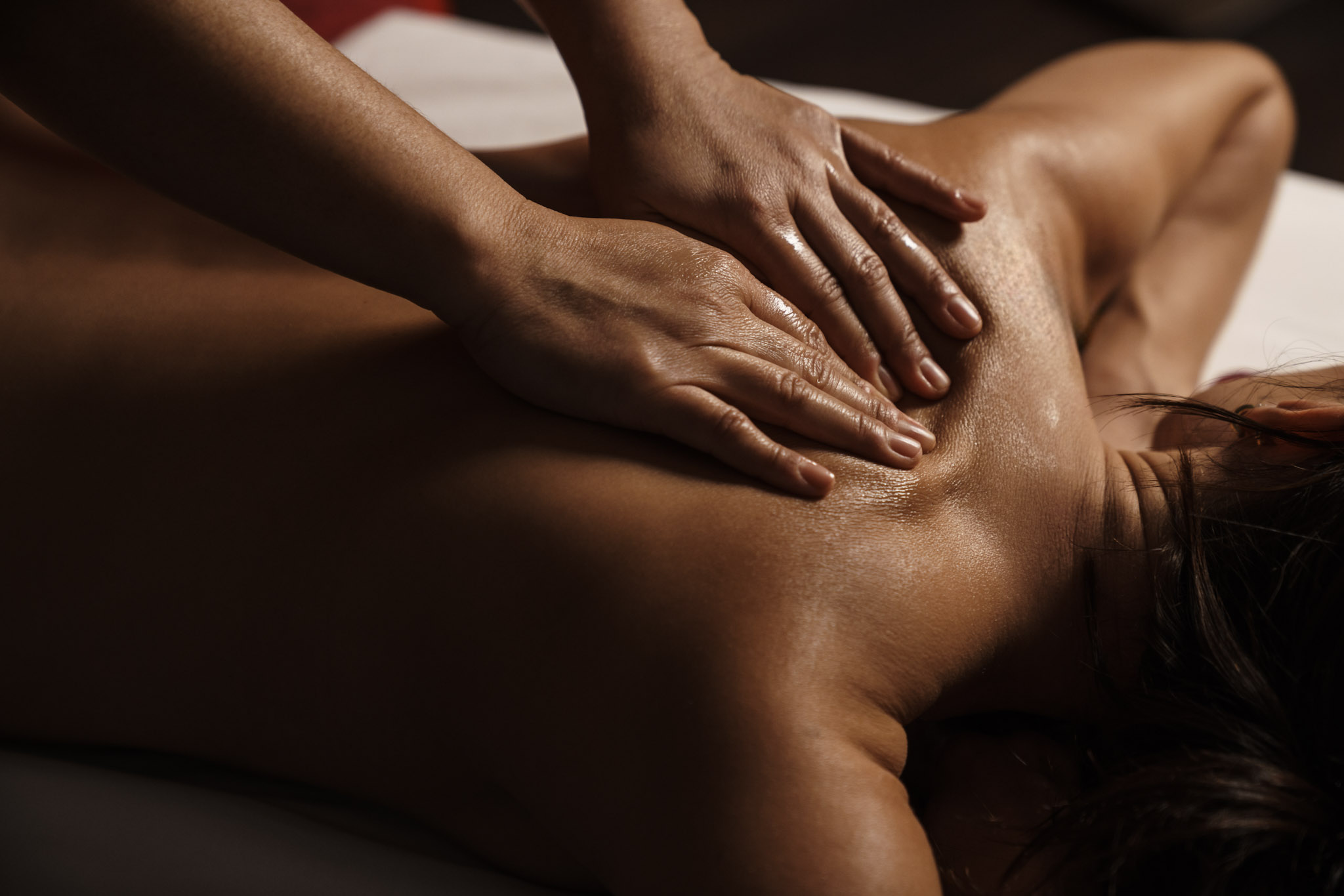 a person receiving a back massage