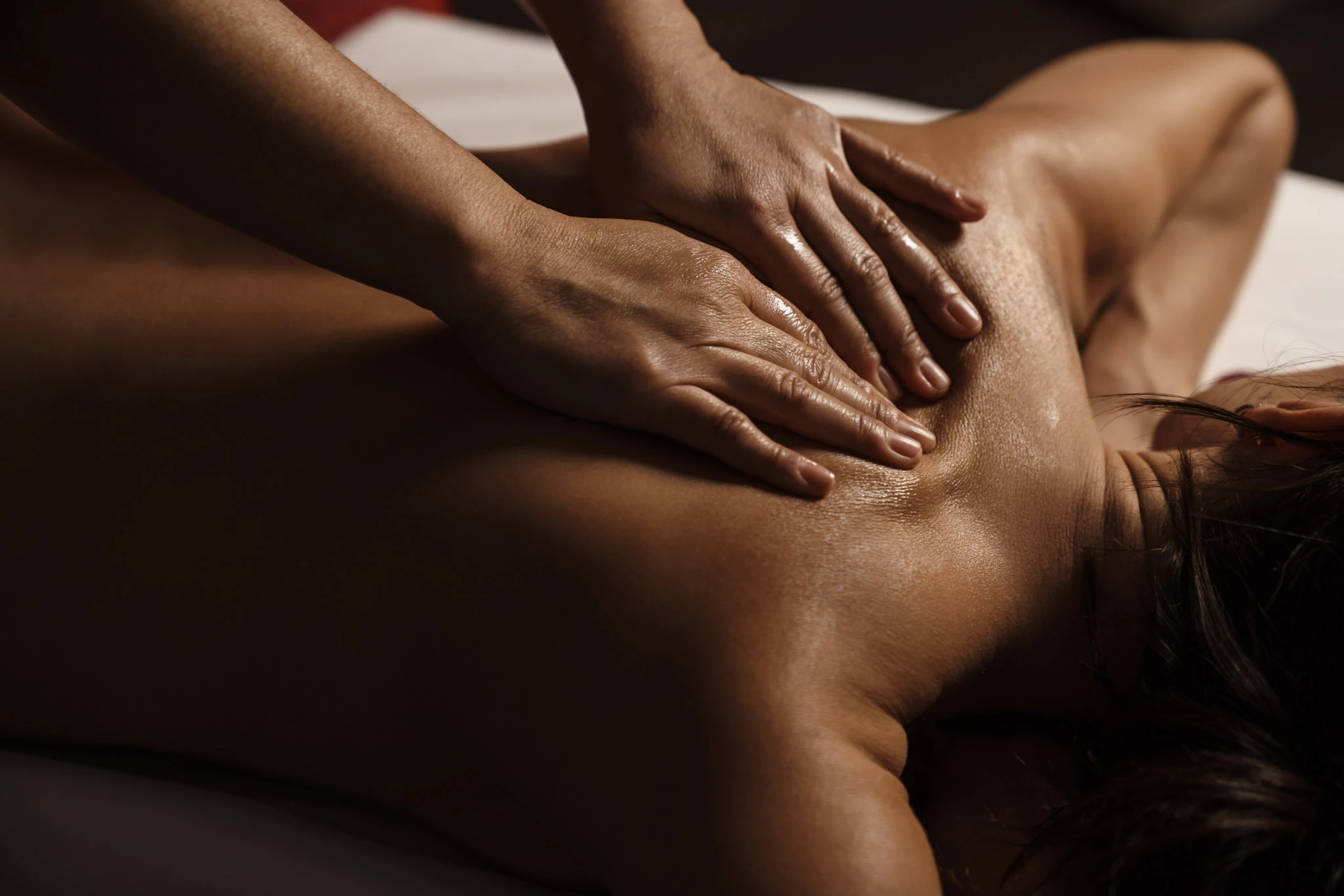 a person receiving a back massage