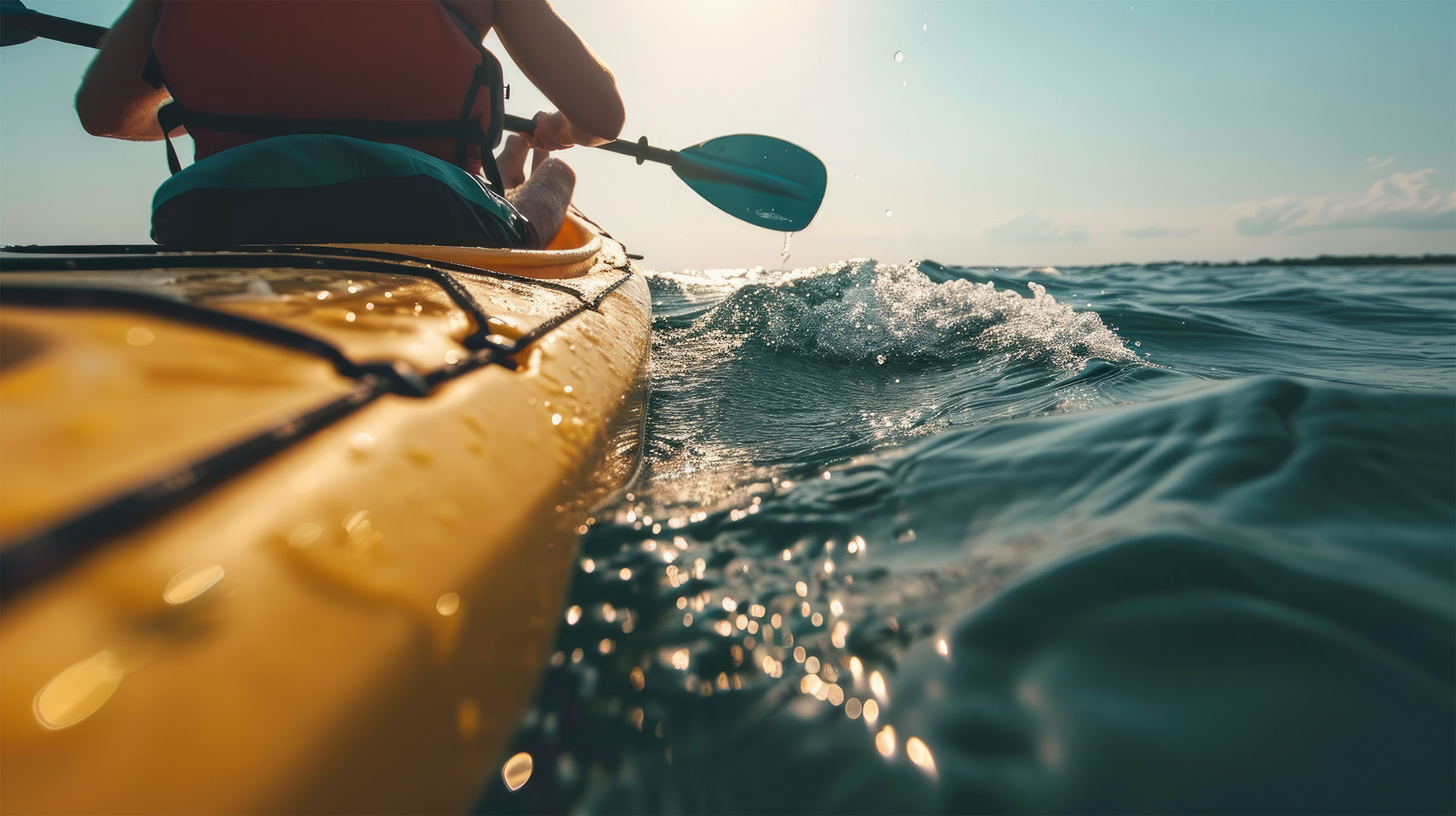 a person in a boat on the water