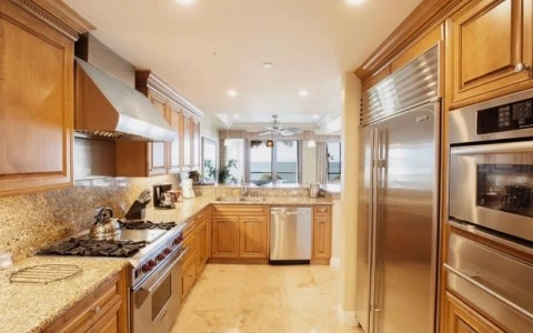 a kitchen with stainless steel appliances