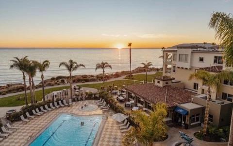 a pool next to a beach