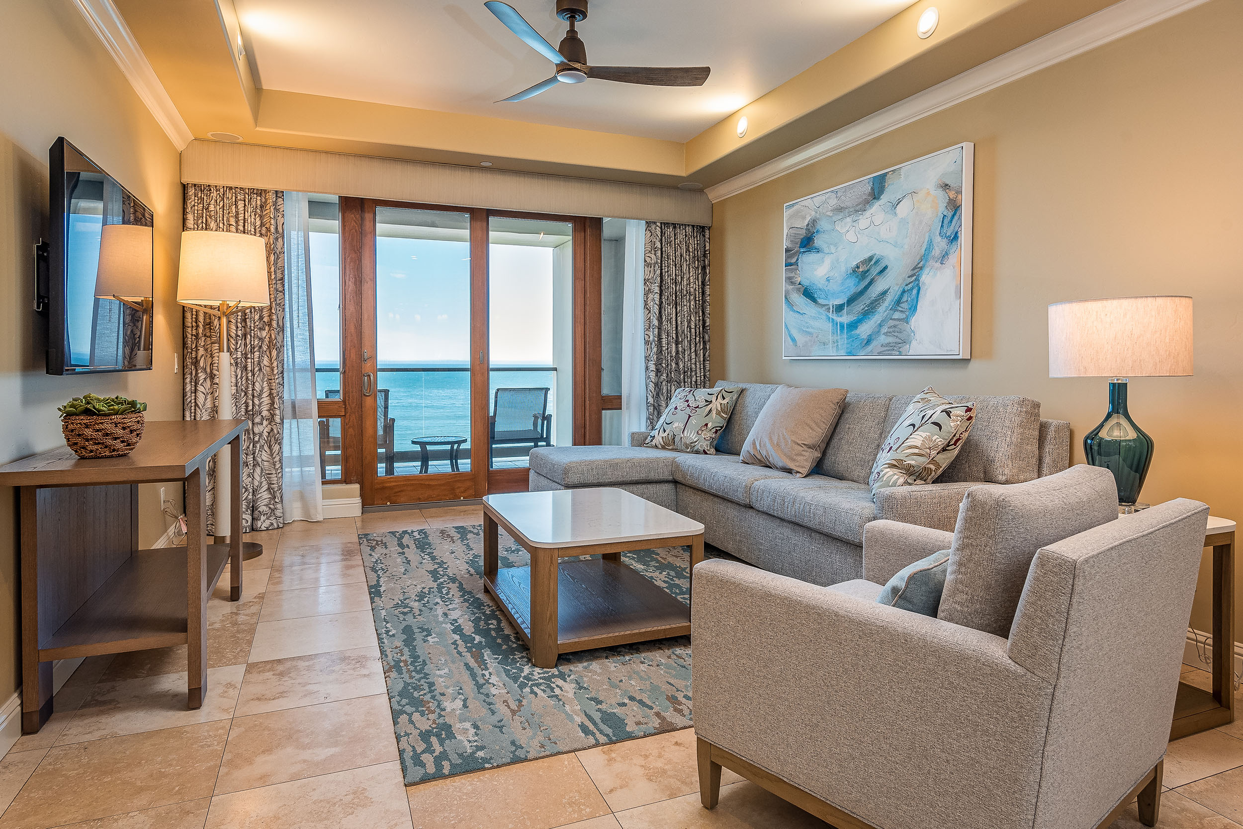 a living room with a couch and a table