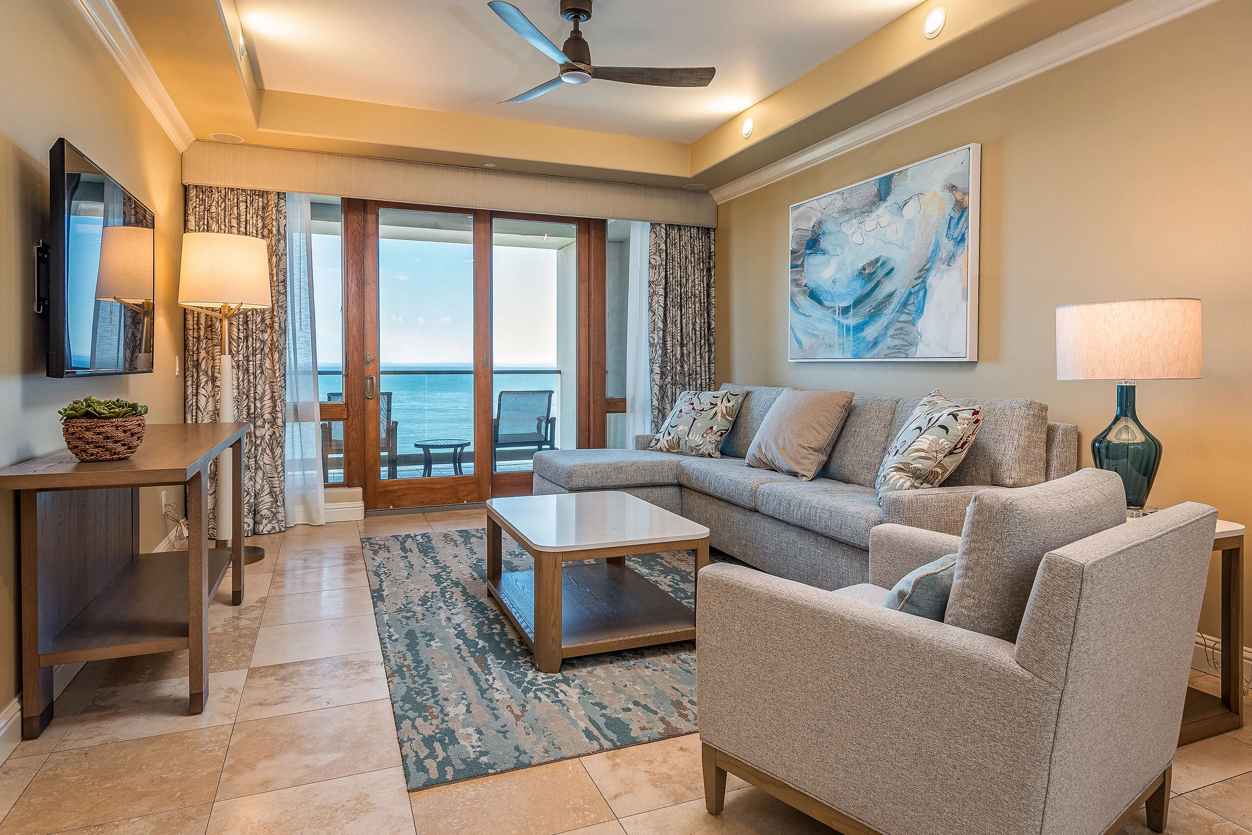 a living room with a couch and a table