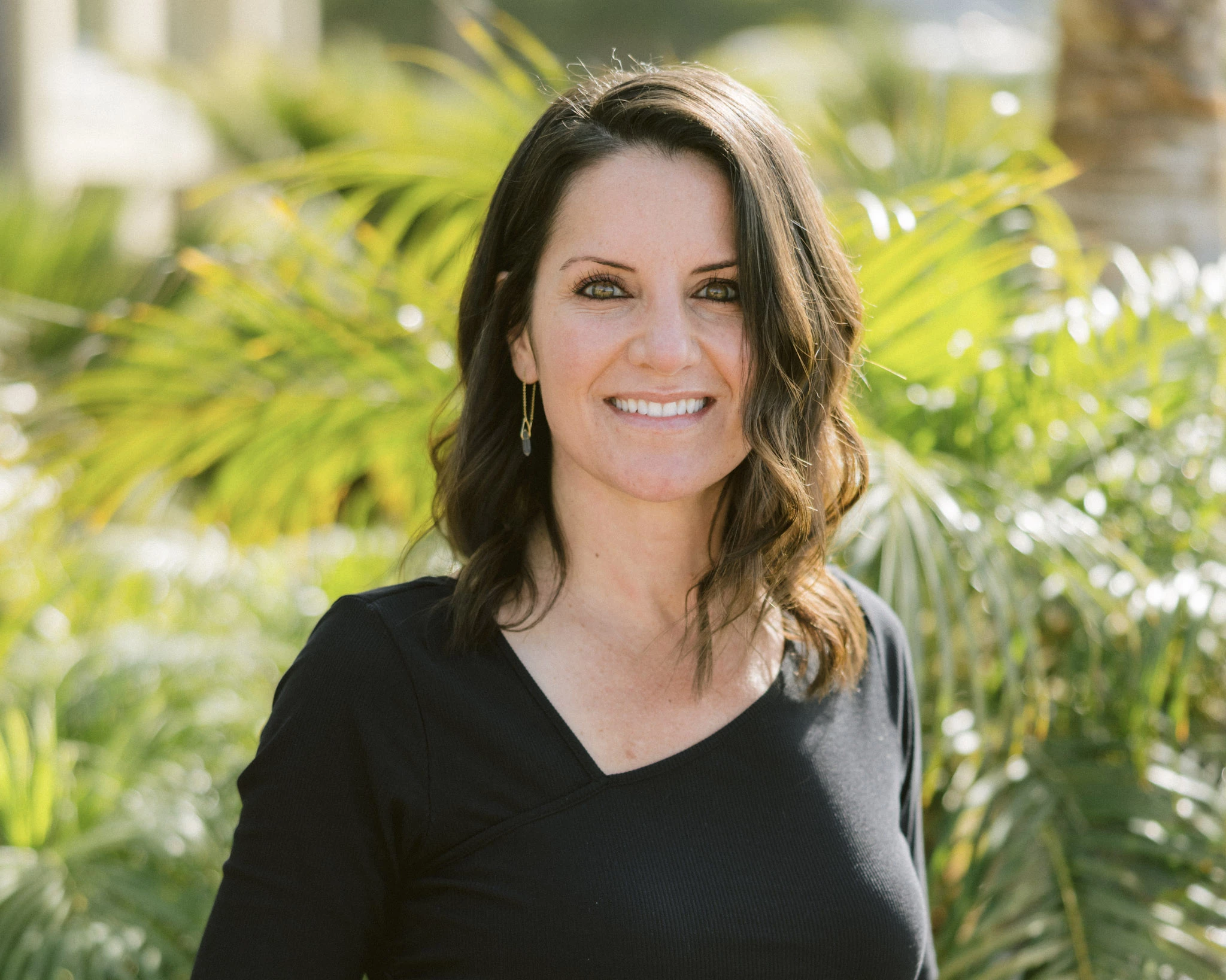a woman smiling at camera