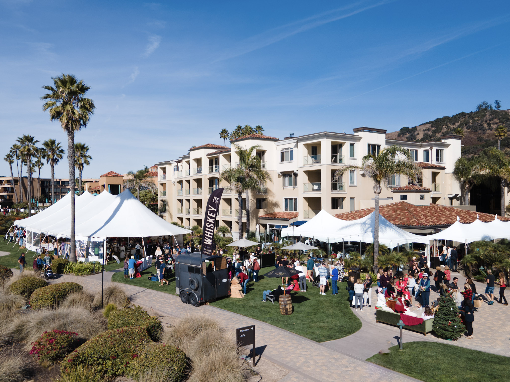 annual holiday cheer market at dolphin bay resort & spa in pismo beach, ca. shop local goods, tastings, oceanfront, santa pictures and storytime. great event for kids.