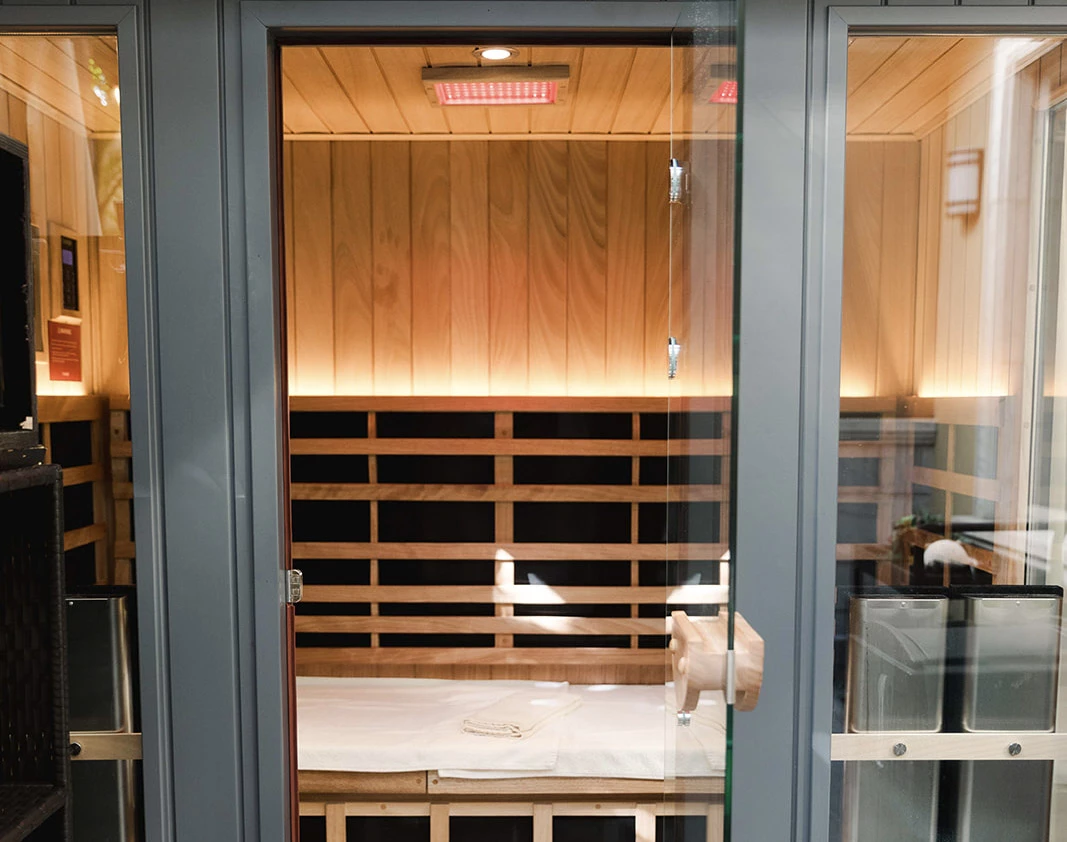 a glass door of a sauna