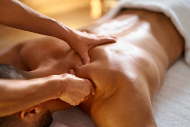 a man receiving a back massage