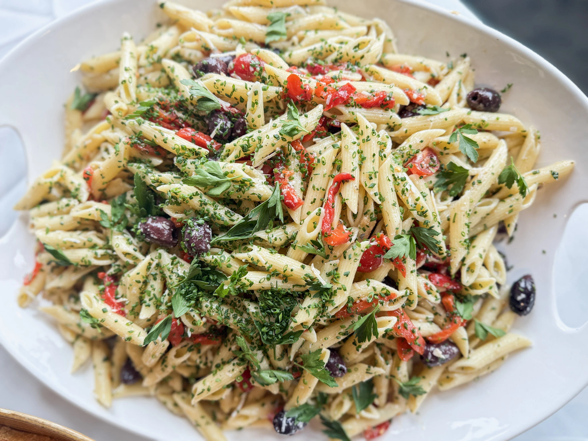 a plate of pasta with herbs and spices
