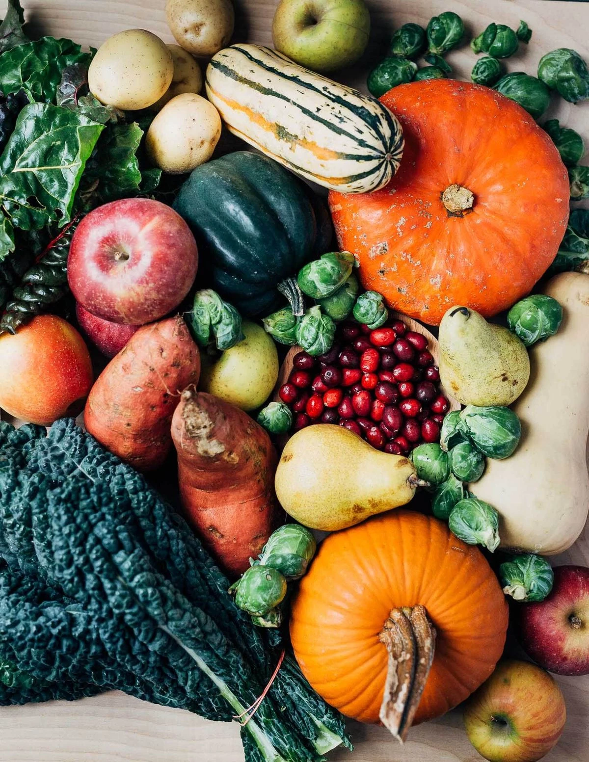 a pile of vegetables and fruits