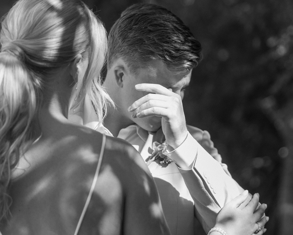 a man touching his face