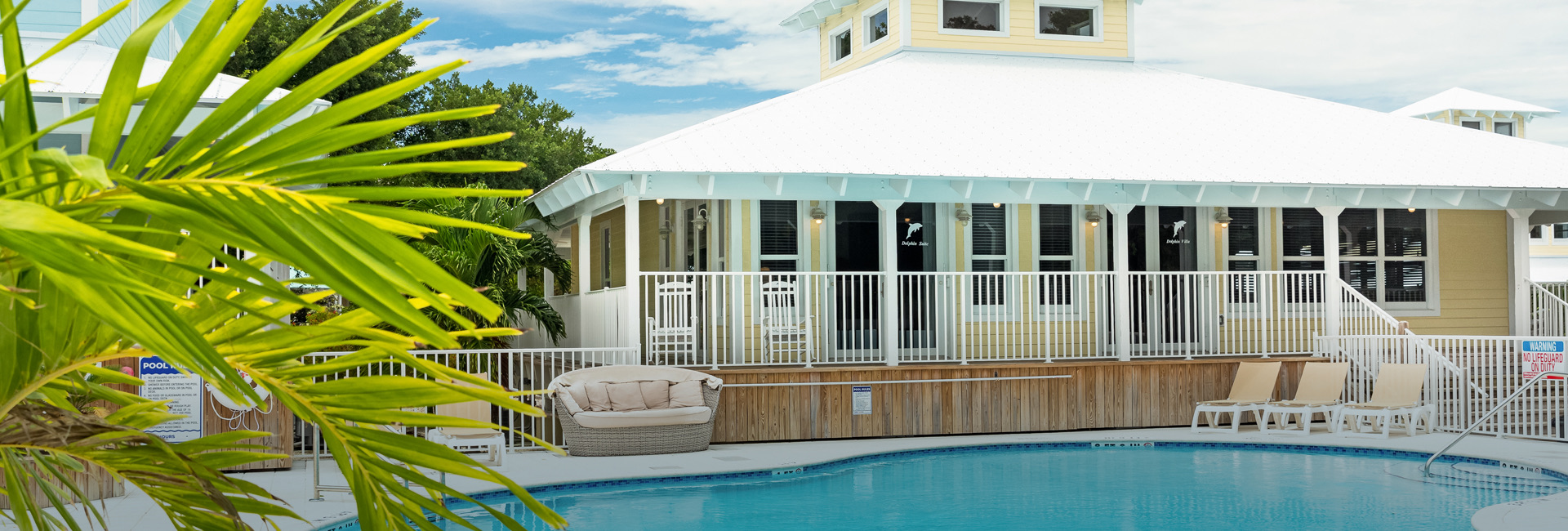a pool in front of a house