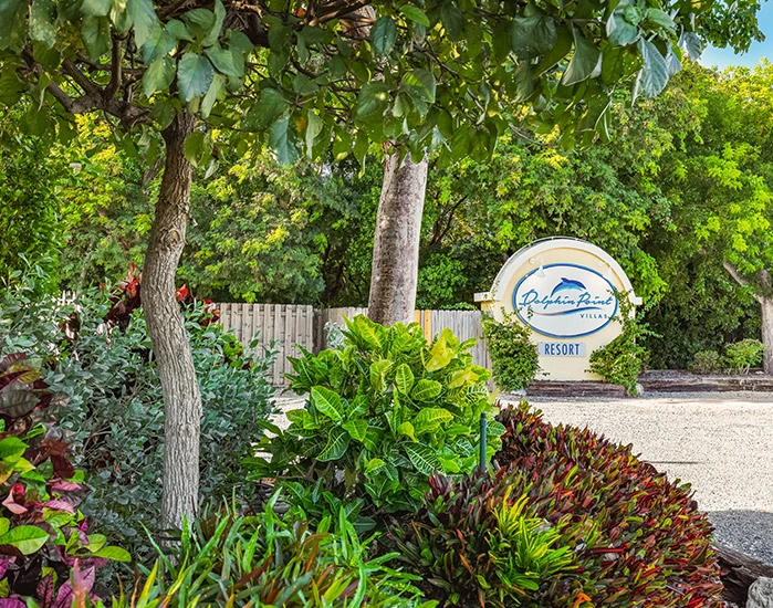 entrance to hotel with Dolphin Point Villas sign