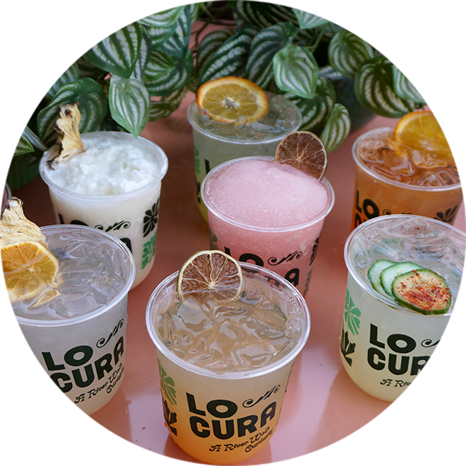 a group of drinks in plastic cups