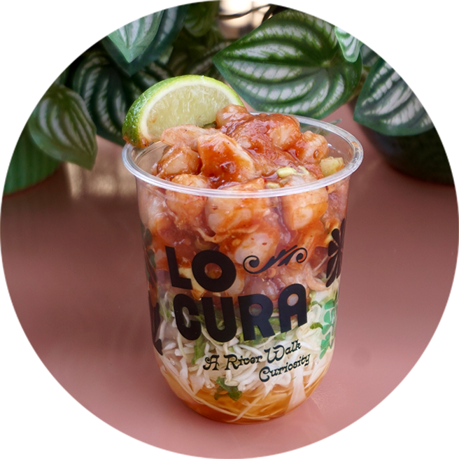 a plastic cup with food in it