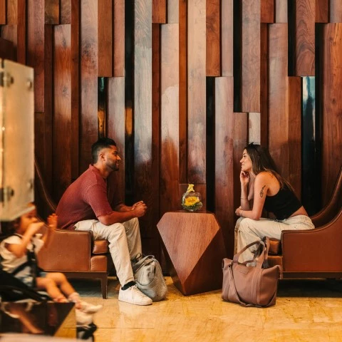 a man and woman sitting in chairs