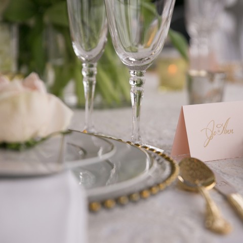 a table with plates and glasses