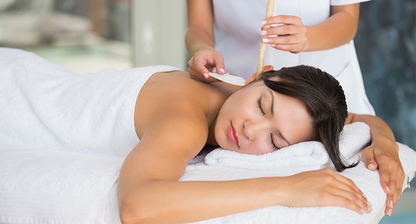 A woman receiving a spa treatment