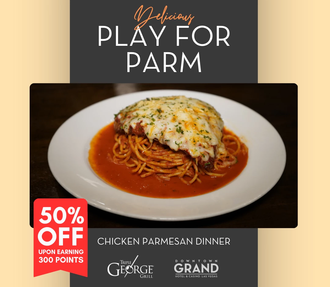 a plate of spaghetti with cheese and sauce