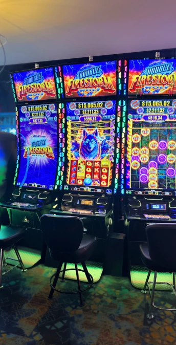 a row of slot machines in a casino