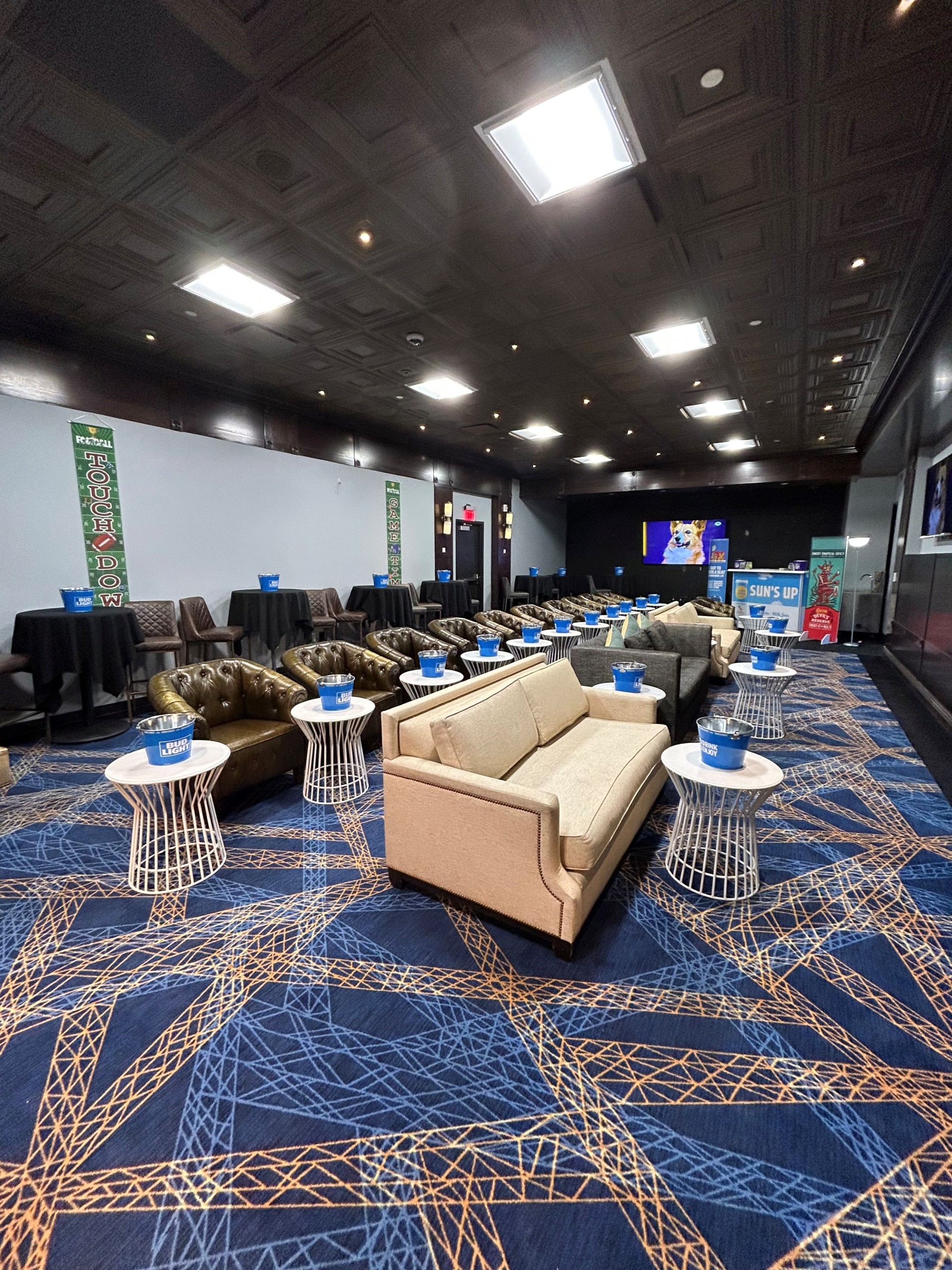 a room with couches and tables