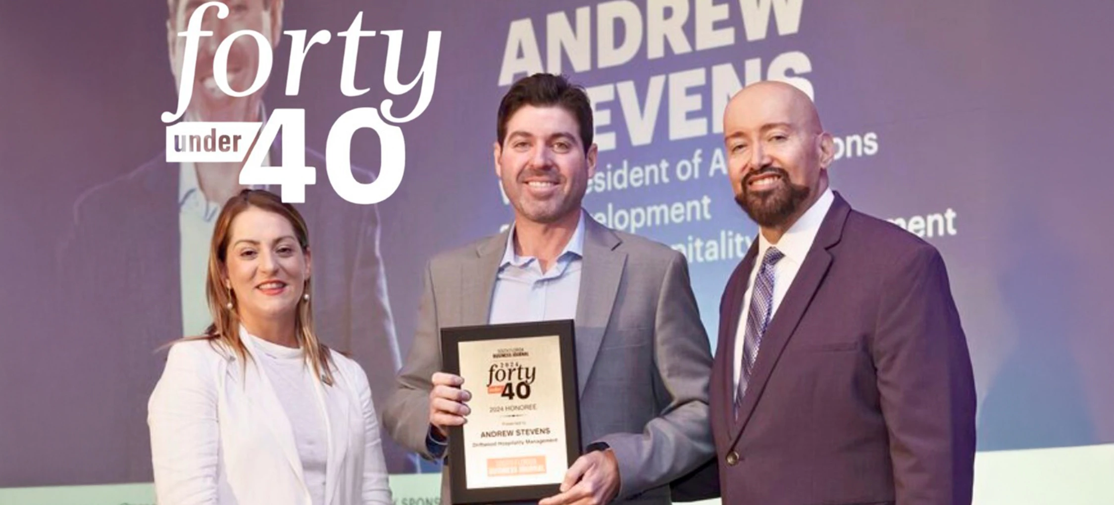 a group of men holding a plaque