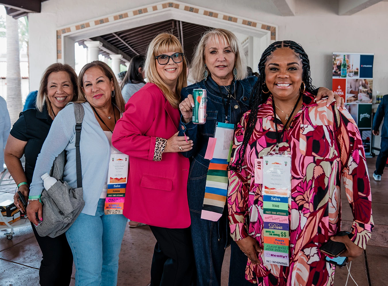 a group of women posing for a photo
