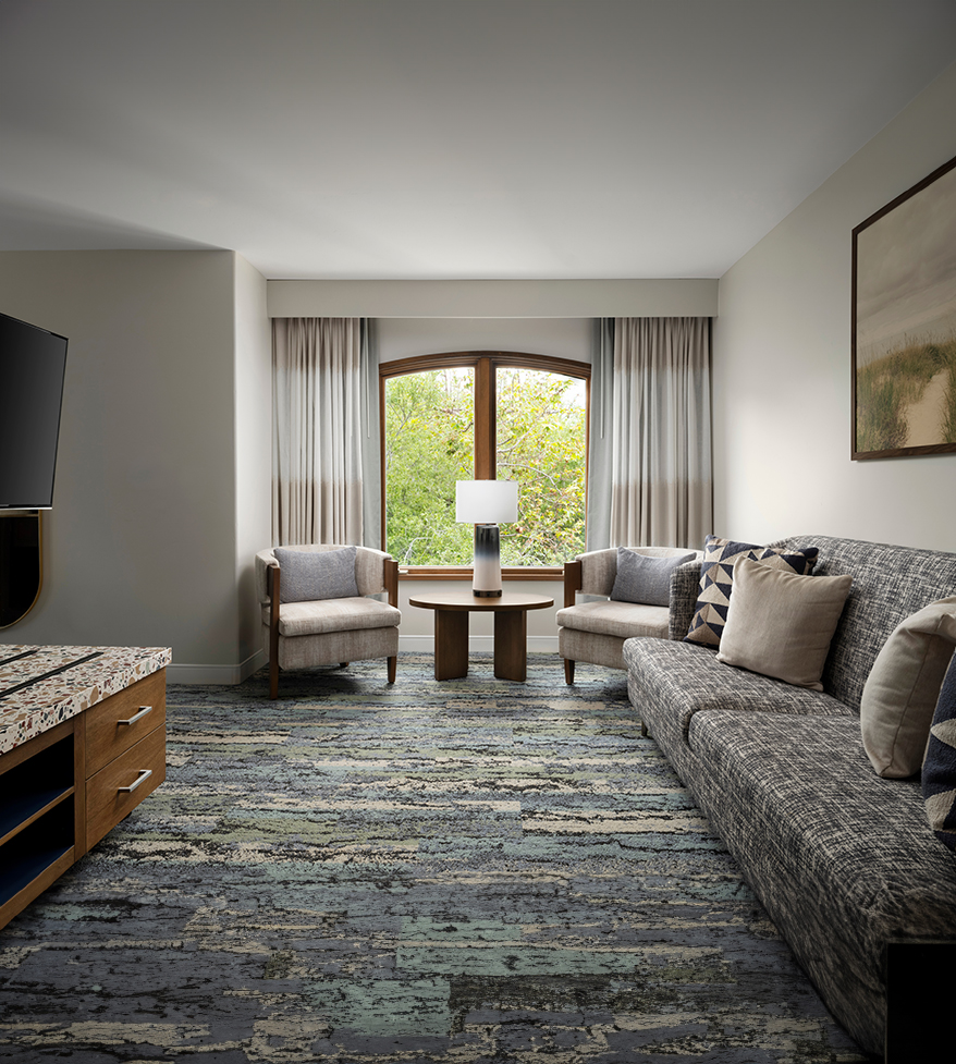 a living room with a couch and a tv