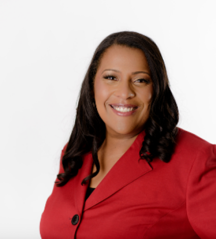 a woman in a red suit