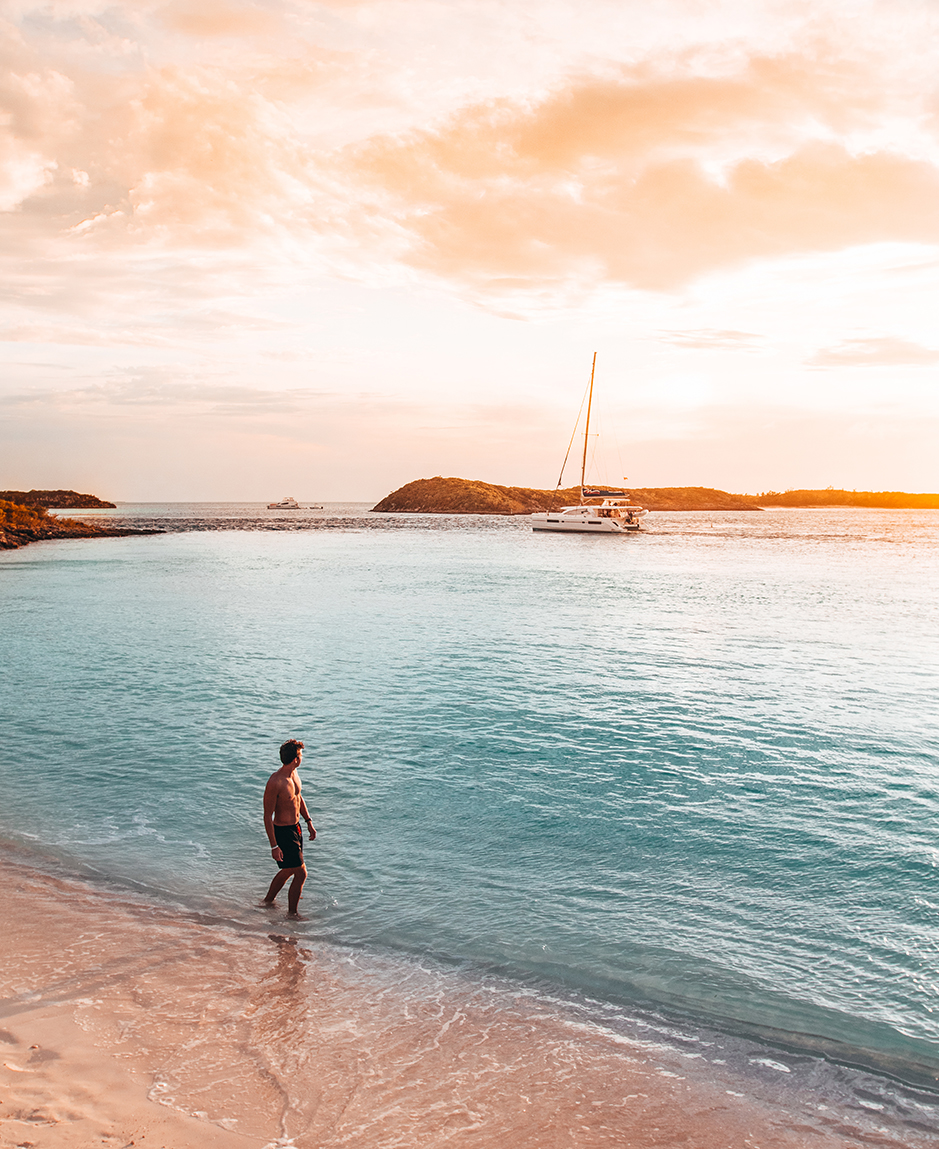a man walking on a beach