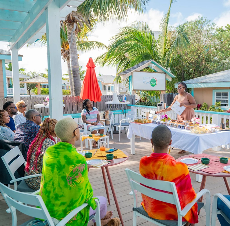 a group of people sitting around a table