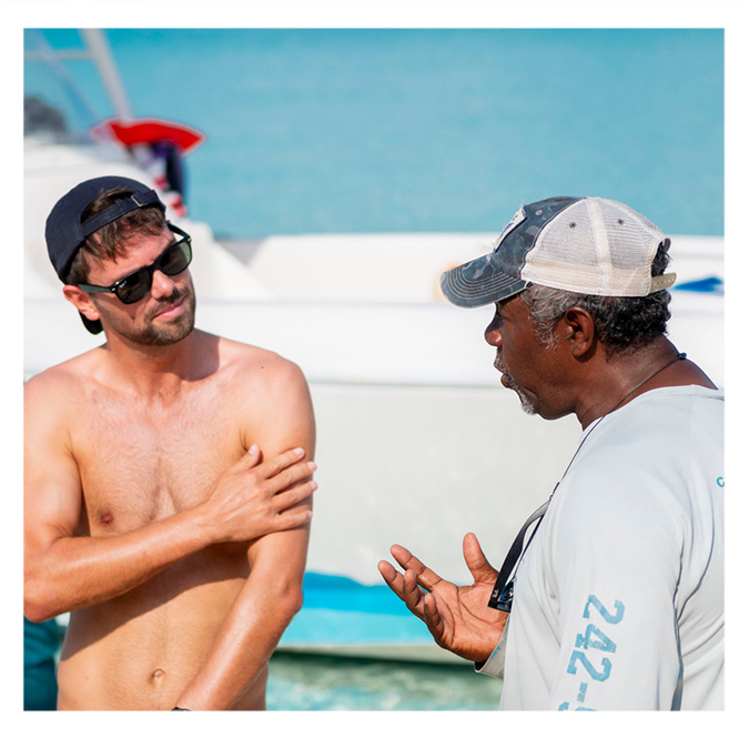 a man talking to another man