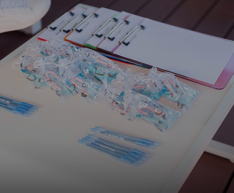 a group of blue objects on a white table