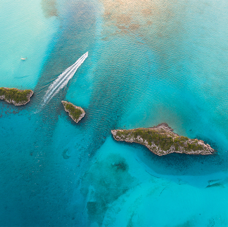 an aerial view of islands in the water