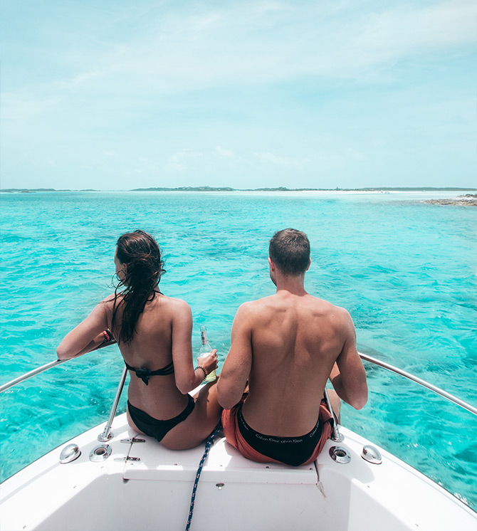 a man and woman on a boat