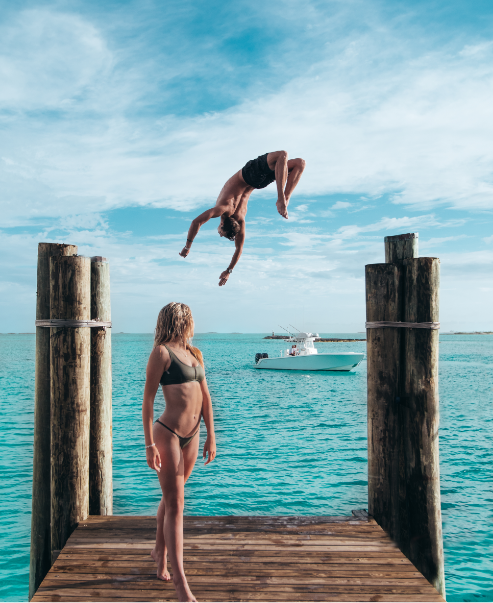 a man jumping into the water