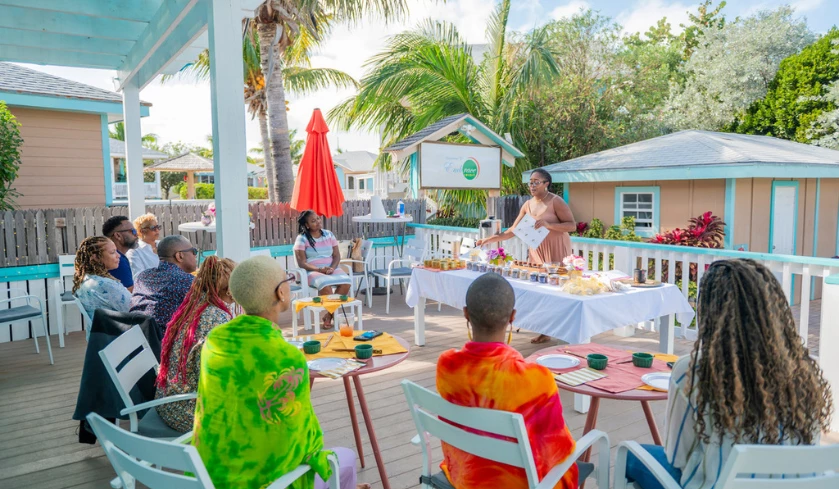 a group of people sitting around a table