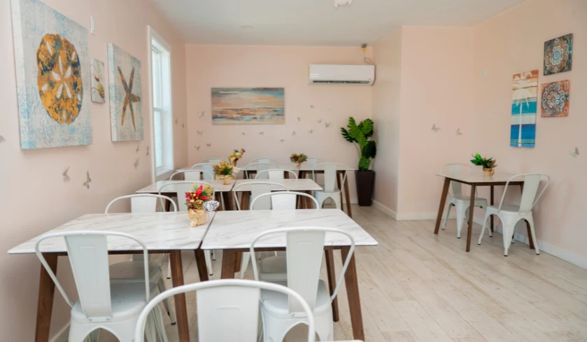 a room with tables and chairs