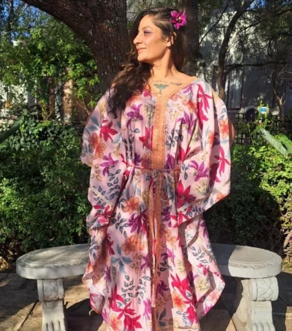 a woman in a pink dress