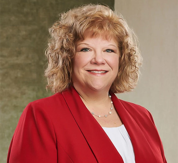 a woman in a red jacket