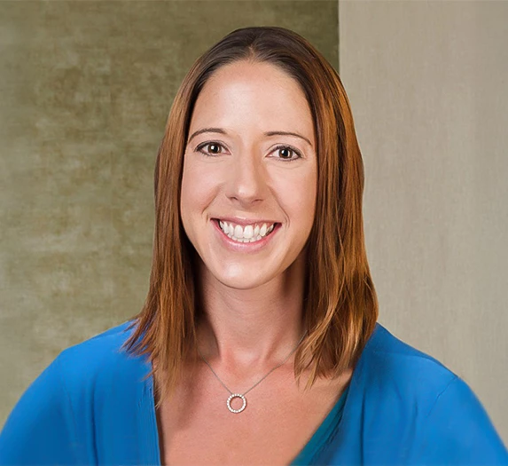 a woman smiling at camera