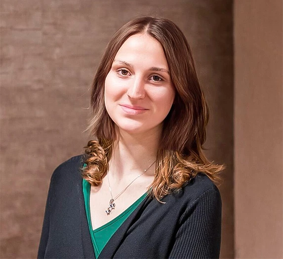 a woman smiling at camera