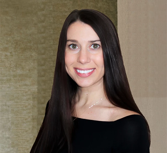 a woman with long hair smiling